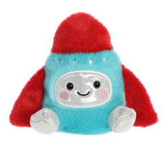 Cute mini rocket ship plush toy with blue and red soft fur, shiny silver accents on face and legs, and a smiling face design