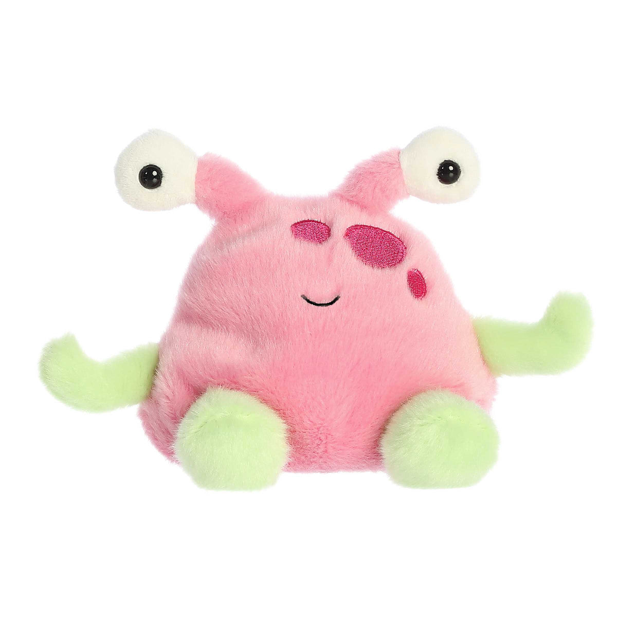 Cuddly tiny alien plush with pink body filled with bean pellets, green arms and legs, and popped-out eyes over its head