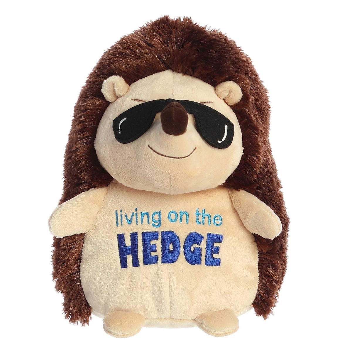 Cute hedgehog plush with light brown body and dark brown fur, "living on the hedge" pun written across and glasses on face