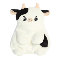 Connor Cow from Fluffles, a plush farmyard friend with soft fur and spots, ideal for play or as charming decor