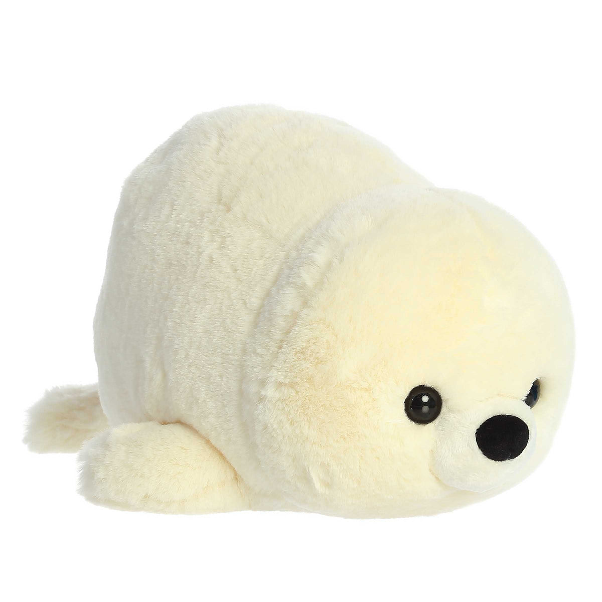 Stella Seal from Spudsters, a potato-shaped plush with creamy white fur and sparkling eyes