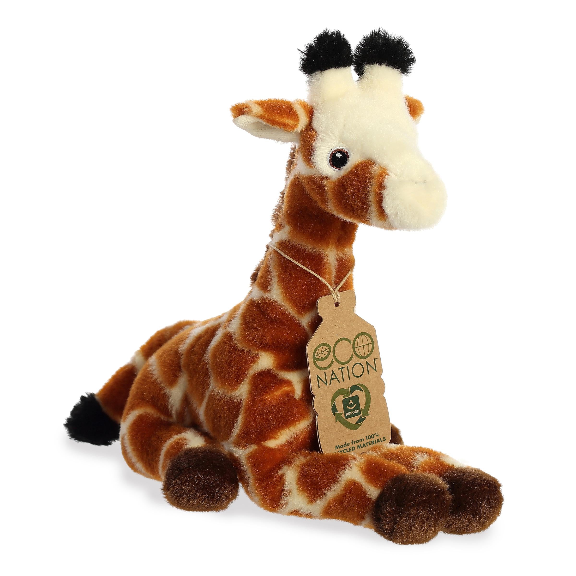 A giraffe plush resembling the real animal with orange and yellow colors throughout, embroidered eyes, and an eco-nation tag