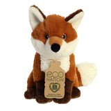 An enchanting fox plush with an orange and white coat, soft embroidered eyes, and an eco-nation tag on the neck