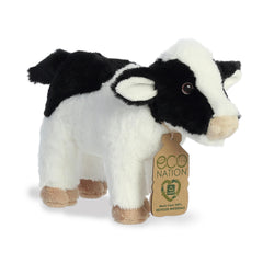 A charming cow plush with the traditional black and white coat, embroidered eyes, and an eco-nation tag by its neck