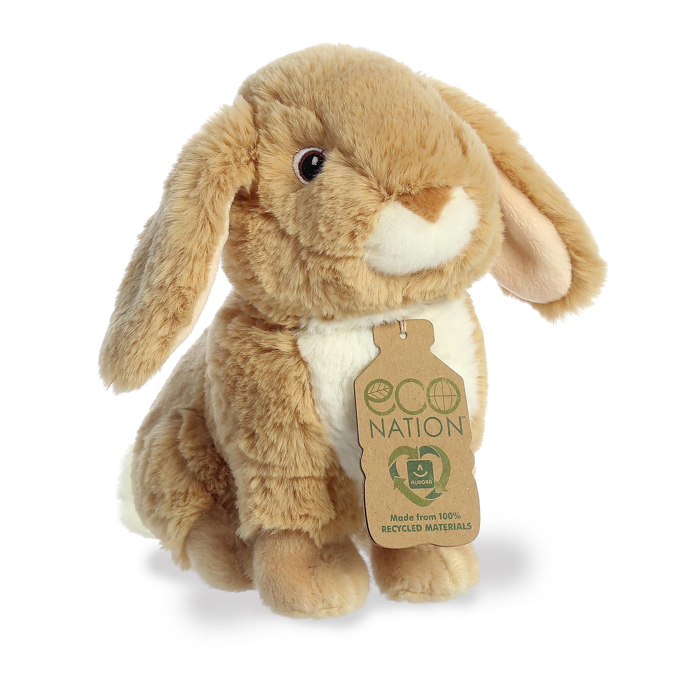 A lovely rabbit plush with tan fur and long ears, sweet embroidered eyes, and an eco-nation tag by its fluffy neck