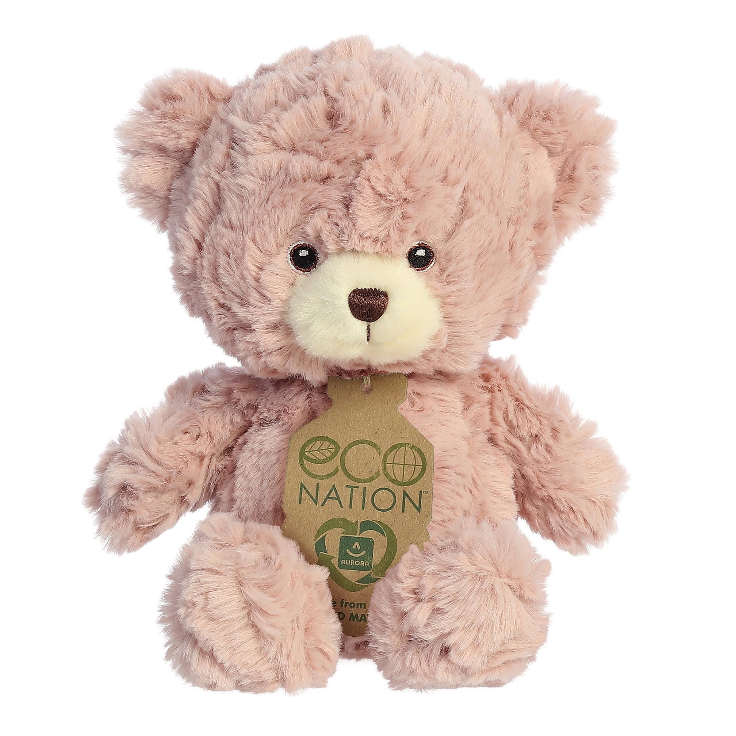 Fluffy bear plush with light fluffy brown fur, sweet embroidered eyes, and an eco-nation tag hanging from its neck