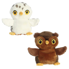 Reverse between a white Snowy Owl plush and a brown Barn Owl plush, made from recycled materials by Aurora eco plush