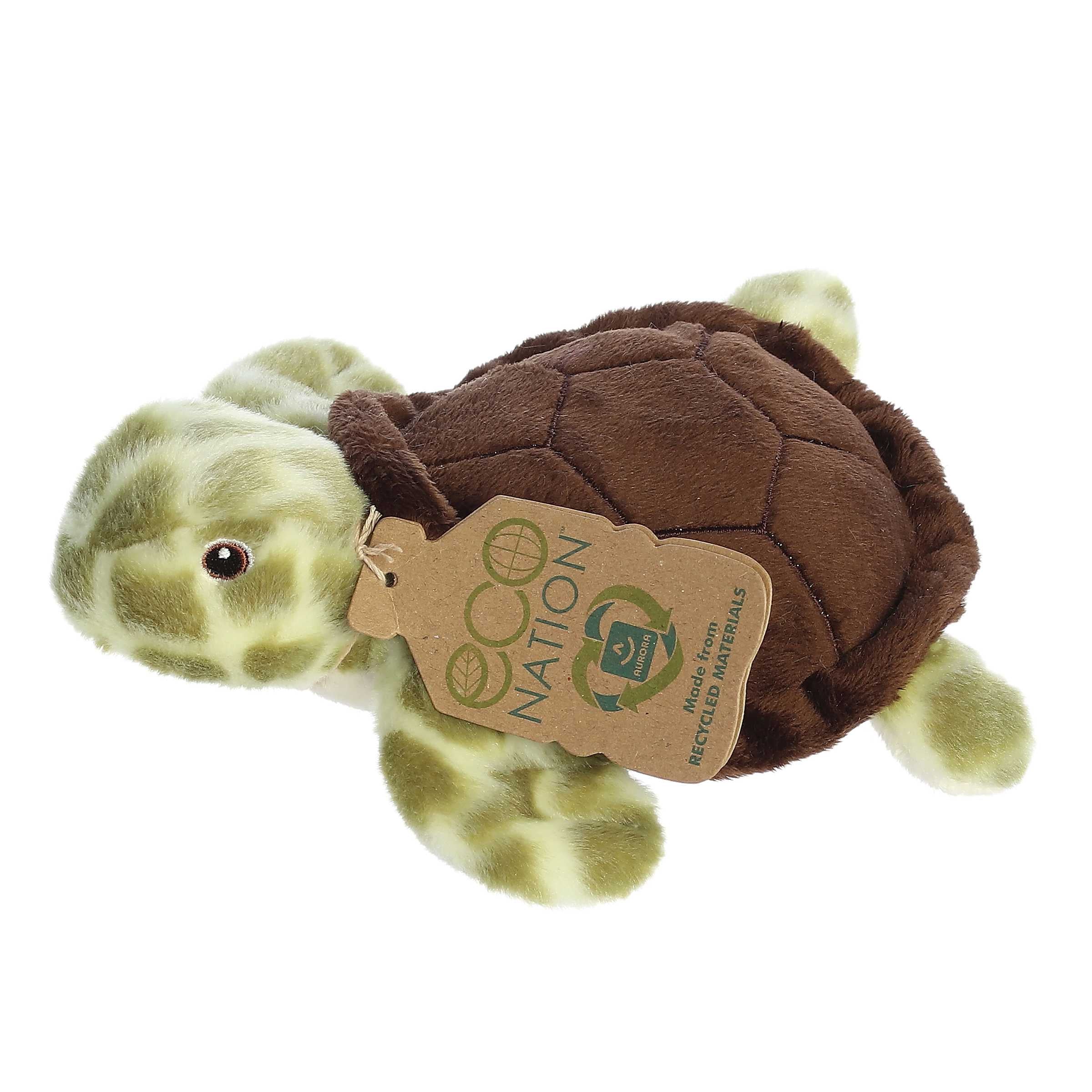 Eco Softie Sea Turtle Plush, green and brown, made from recycled materials, with a hang tag symbolizing sustainable choices.