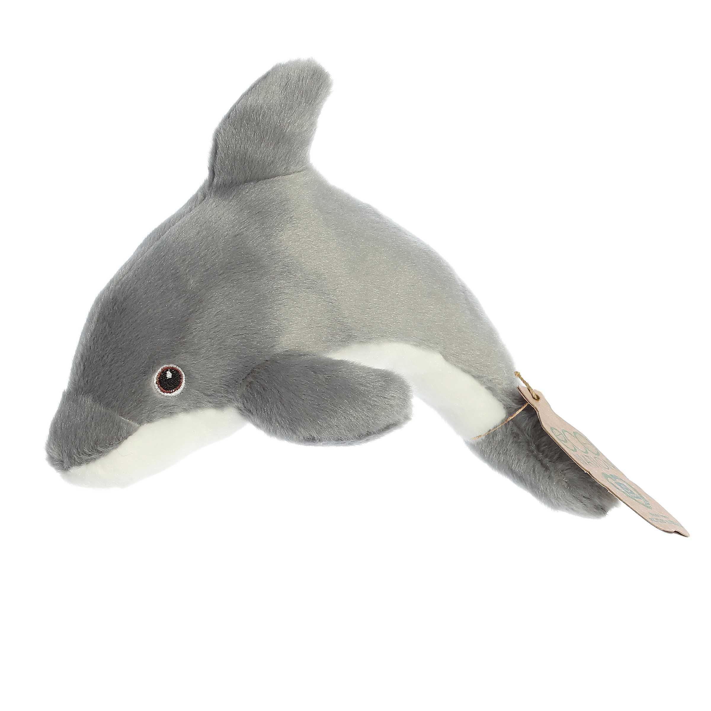 Eco Softie Dolphin Plush in grey and white, made from recycled materials, with a hang tag representing eco-friendliness.