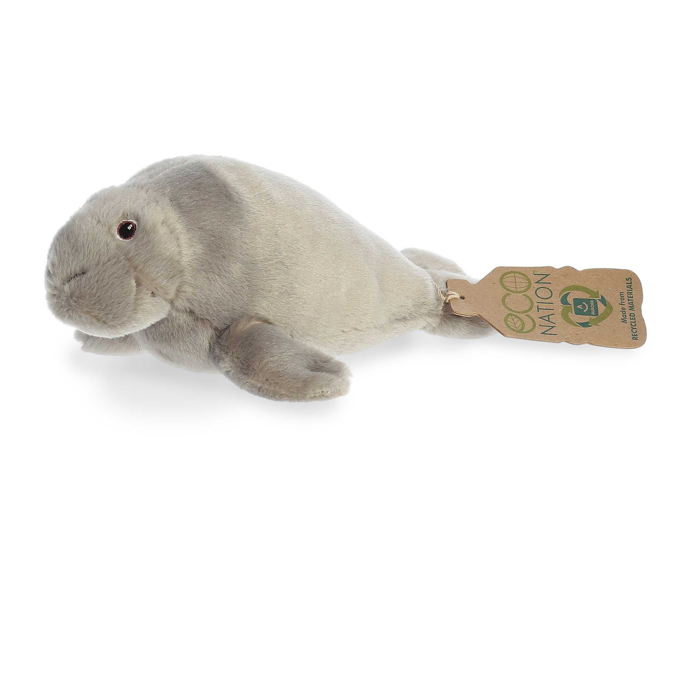 Eco Softie Manatee Plush, crafted from recycled plastic bottles, in gentle grey, with a hang tag for environmental awareness.