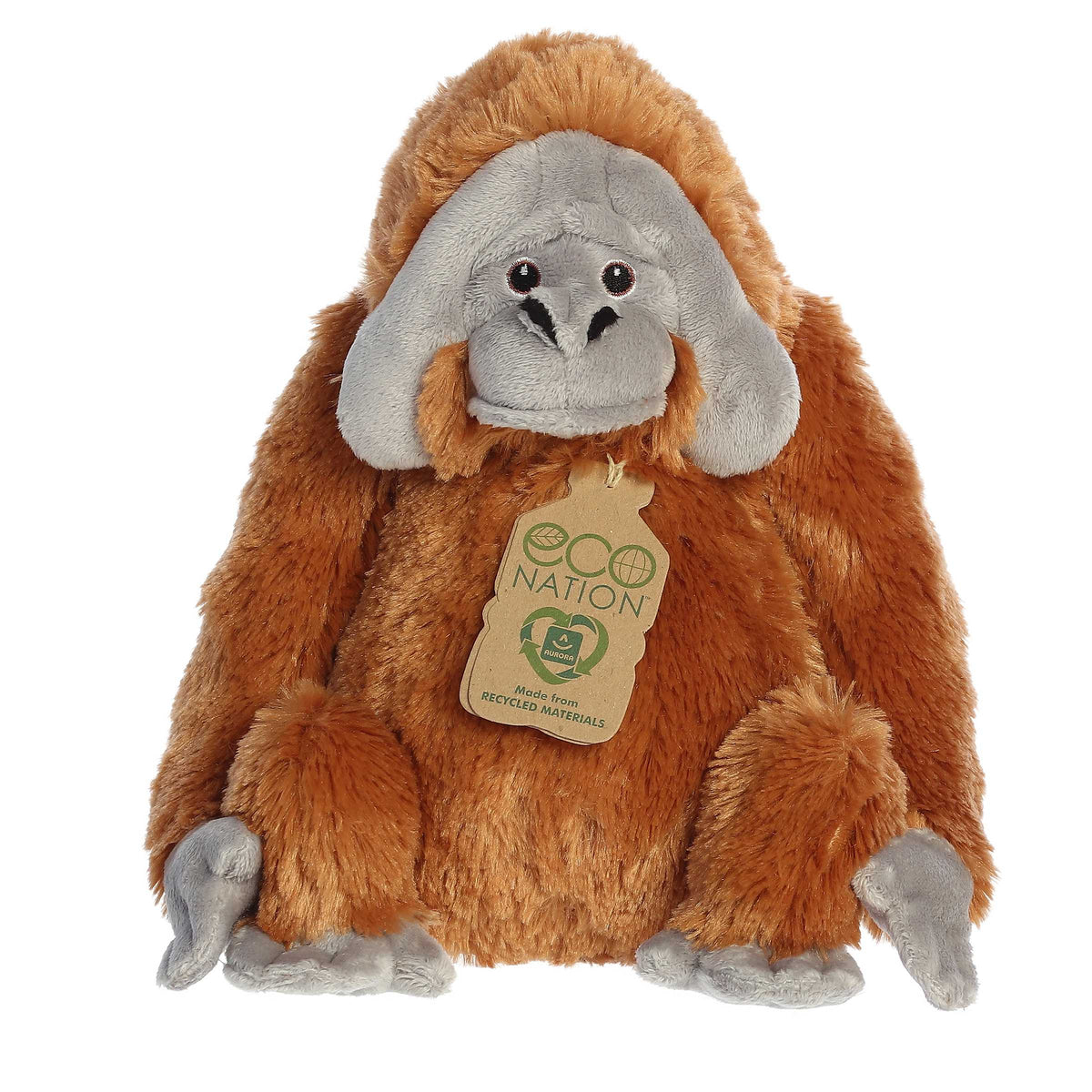 Eco Hugs Orangutan by Aurora, with rich amber fur, a gentle gaze, and a hang tag for its eco-friendly, recycled origins.
