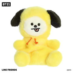 Cute mini BT21 plush toy with a fluffy bright yellow body, black ears, white round face, and black accents on a smiling face