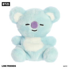 Adorable mini BT21 character plush toy with a fluffy light blue and white body and purple and black embroidery on face.