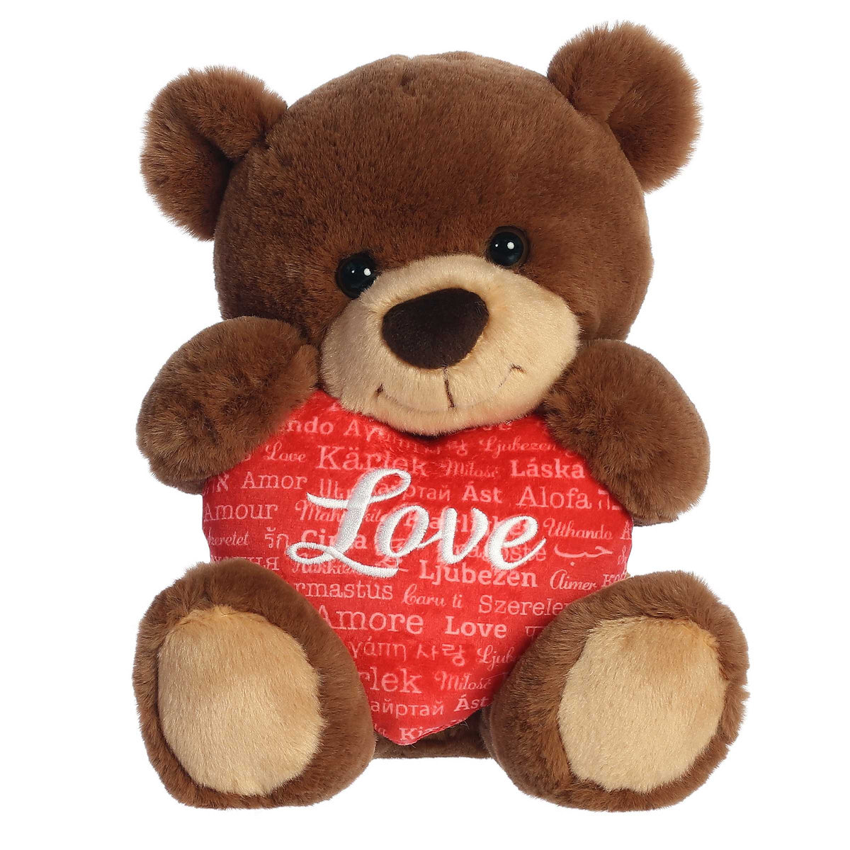 Soft Brown bear plush, holding a red heart with 'Love' in different languages. Symbolizing global affection and unity.