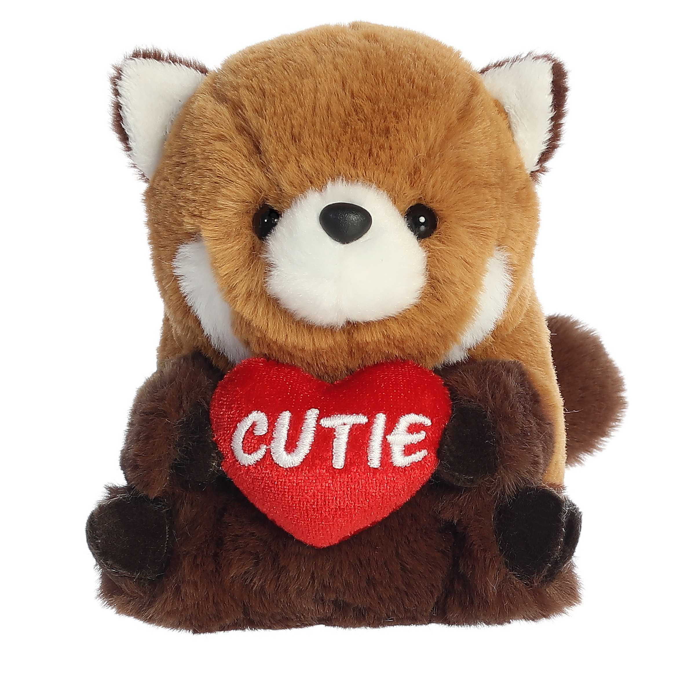 A burnt orange-colored red panda plush from Rolly Pets, holding a 'Cutie' heart, in a playful, balanced pose.