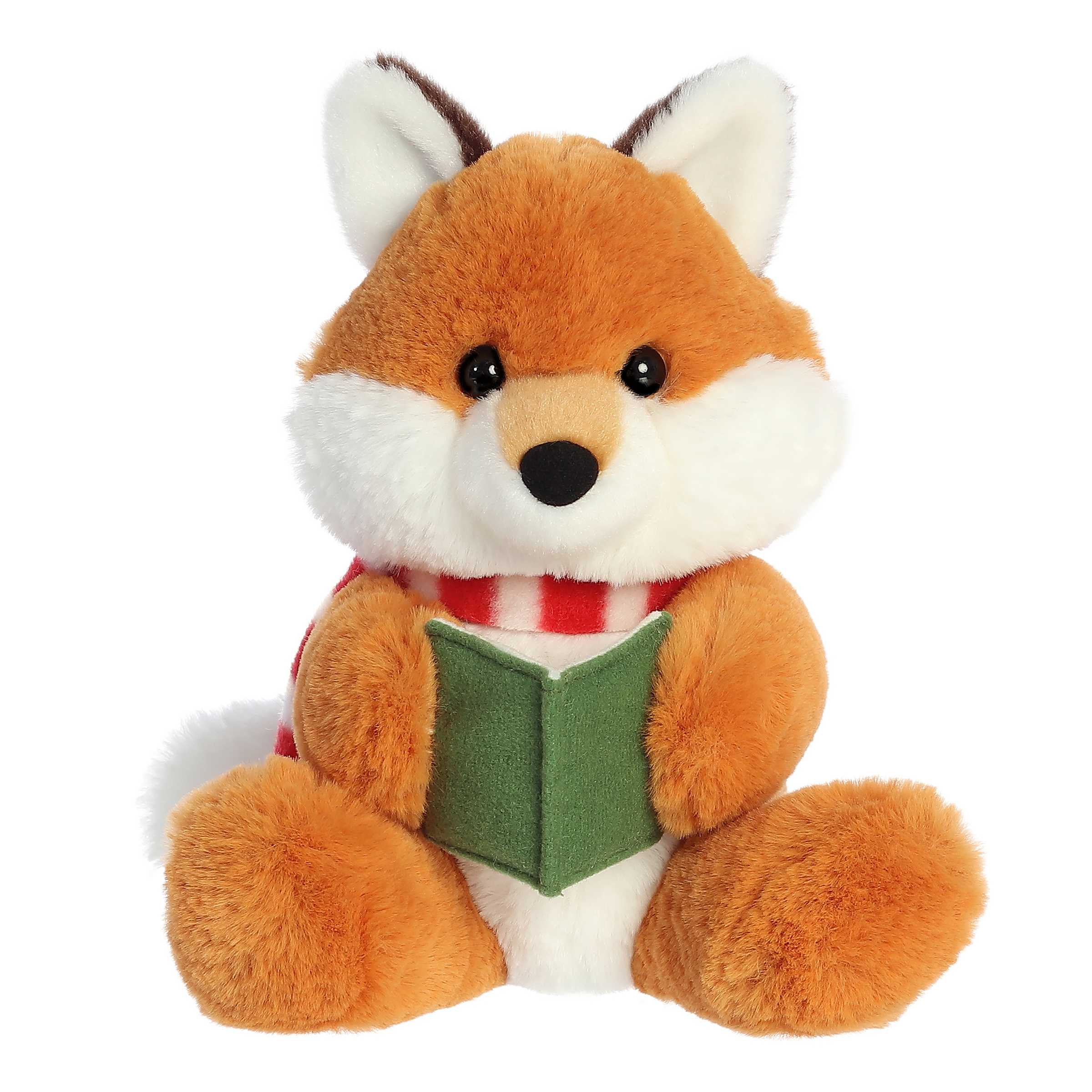 Adorable orange fox stuffed animal wearing a cozy red and white striped scarf and holding an open green songbook