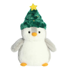 Gray back and white front stubby penguin stuffed animal wearing a green Christmas tree hat with a yellow star on top