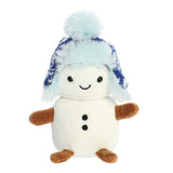 Smiling mini white snowman plushie with tiny arms and legs wearing blue knit sweater print ushanka with a pompom on top
