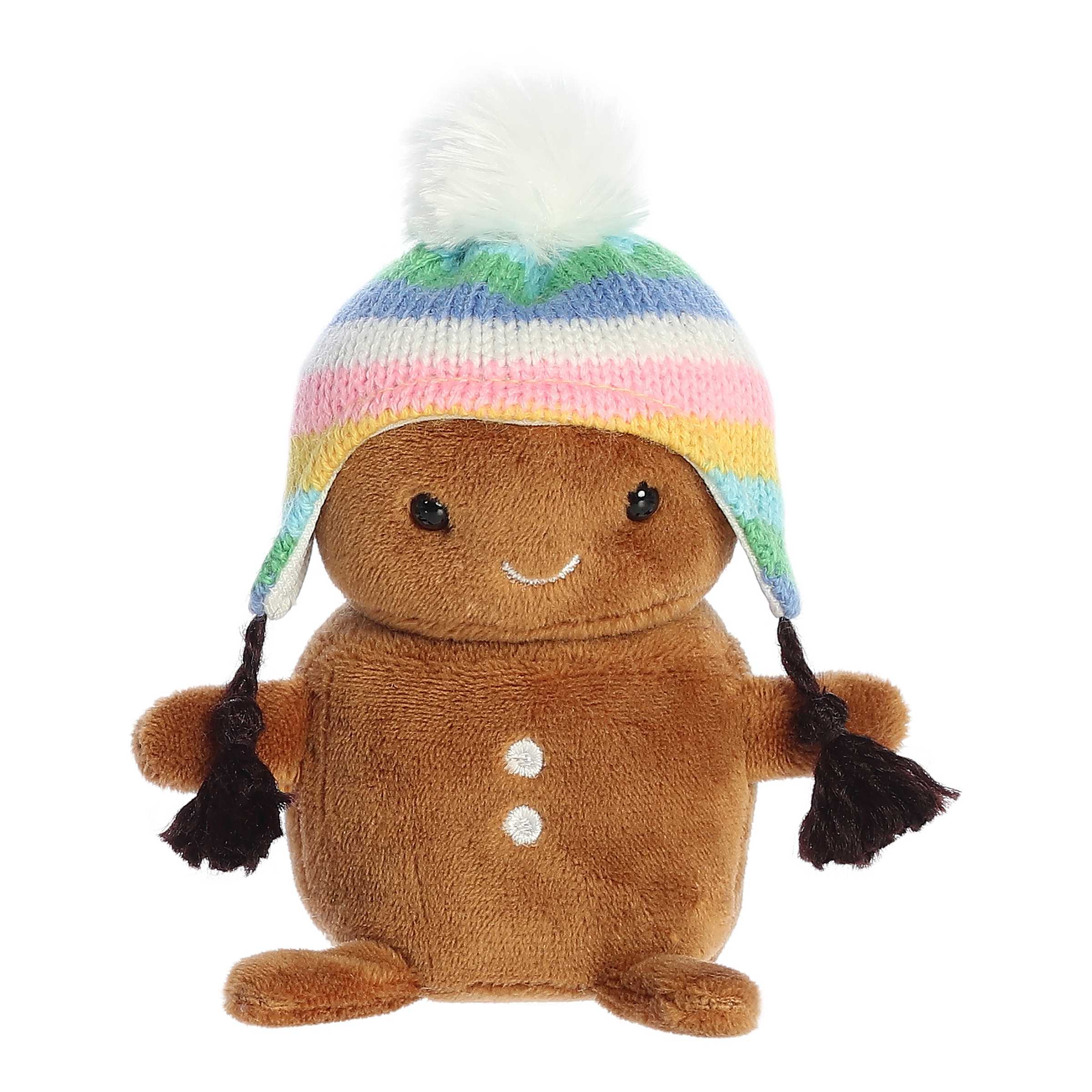 Happy mini brown gingerbread man plushie with tiny arms and legs wearing a cute colorful knit beanie with a pompom on top
