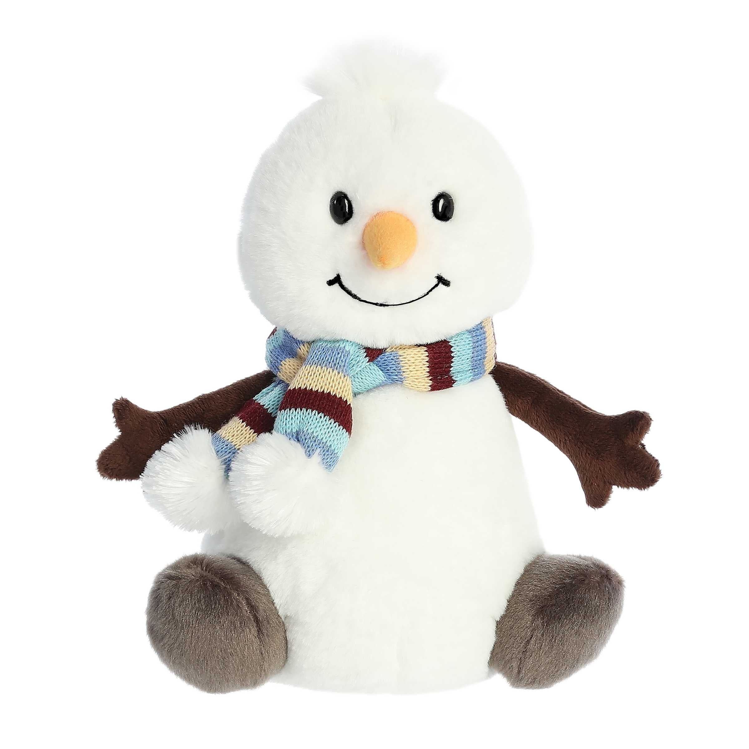 Smiling white snowman plushie with stick arms tiny feet wearing a cozy winter scarf and carrot nose