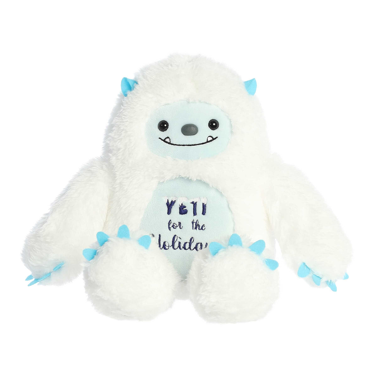 Yeti stuffed animal with bright blue accents and tummy embroidered with "Yeti for the Holidays" in a festive snowy font.