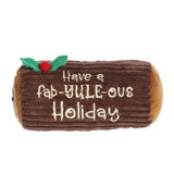 Dark brown Yule Log plush toy with a white swirl in the center embroidered with "Have a fab-YULE-ous Holiday" and a holly sown on the top